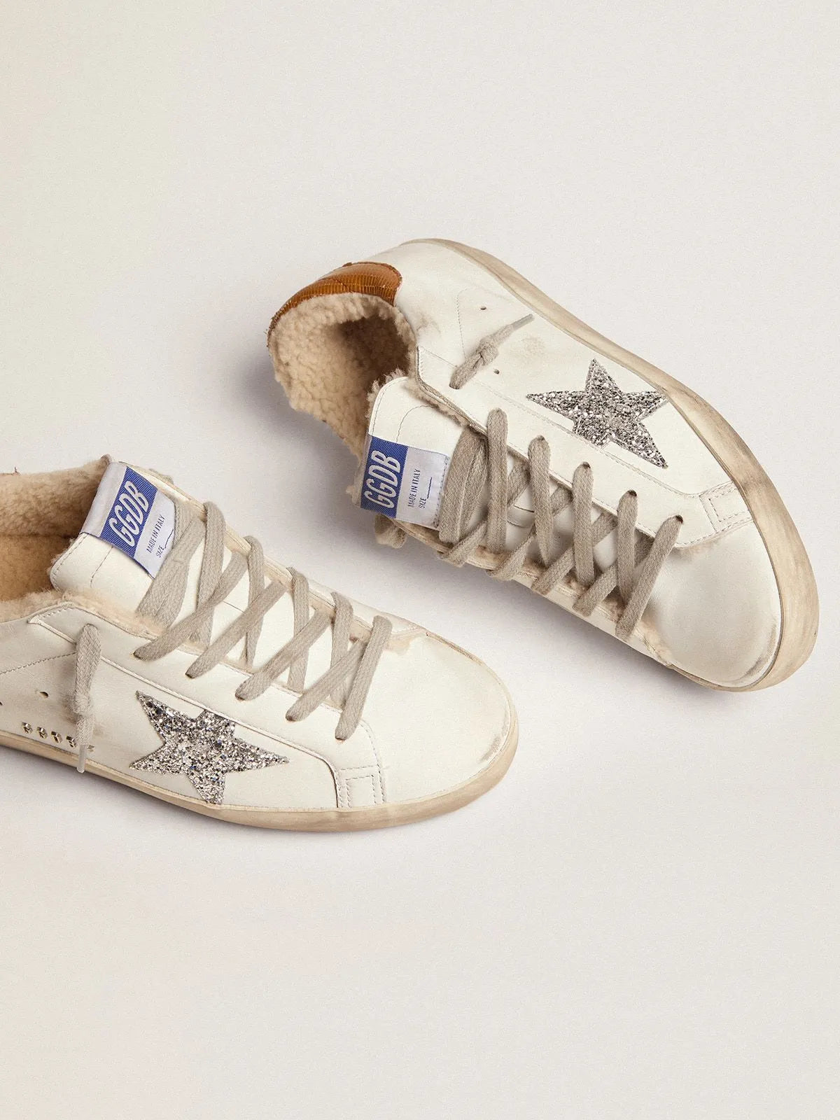 Super-Star sneakers with shearling lining. silver glitter star and lizard-print dove-gray leather heel tab