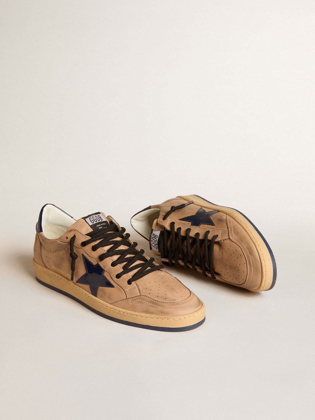 Ball Star in beige leather with blue patent leather star and heel tab