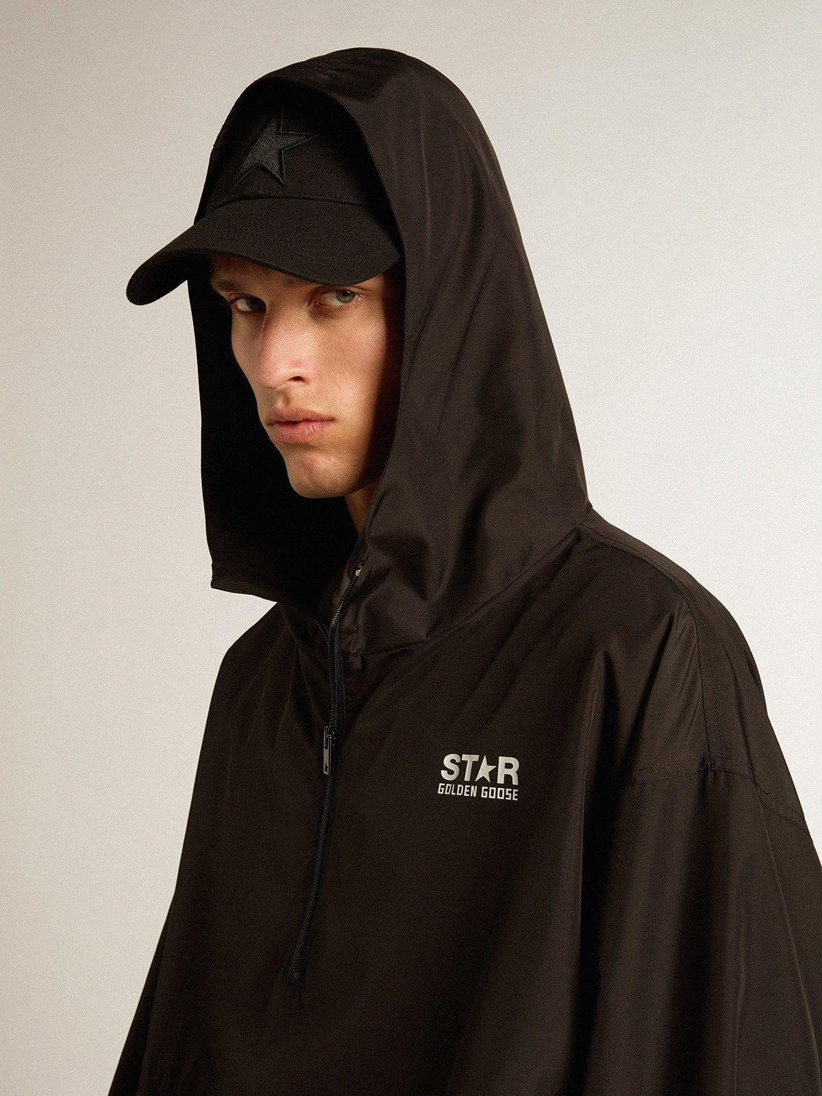 Black windbreaker with hood
